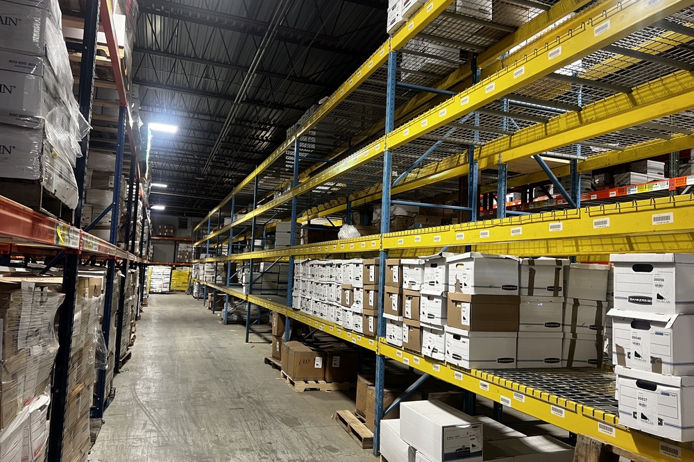 Images of used warehouse equipment liquidated from a record storage facility in Nashua, New Hampshire