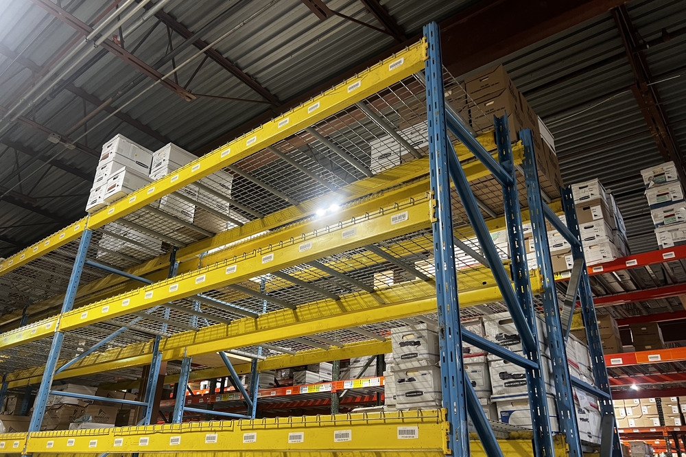 Images of used warehouse equipment liquidated from a record storage facility in Nashua, New Hampshire