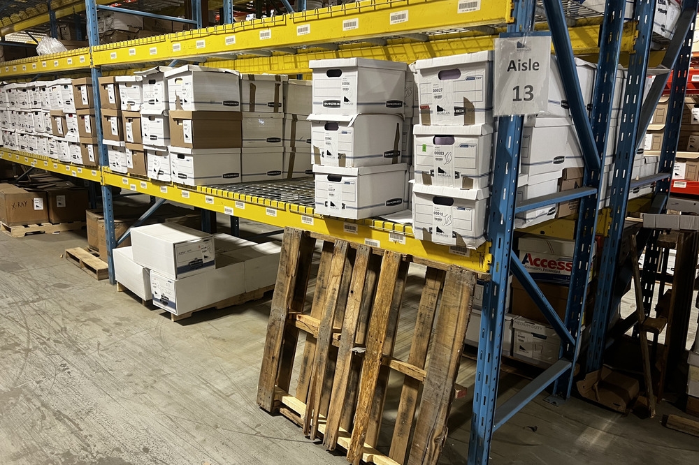 Images of used warehouse equipment liquidated from a record storage facility in Nashua, New Hampshire
