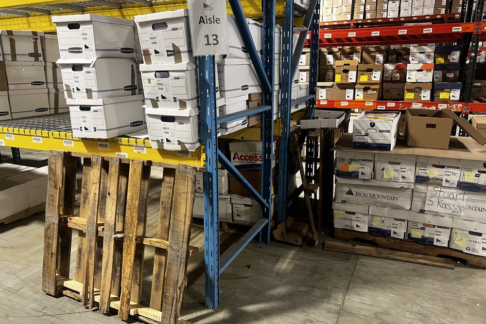 Images of used warehouse equipment liquidated from a record storage facility in Nashua, New Hampshire