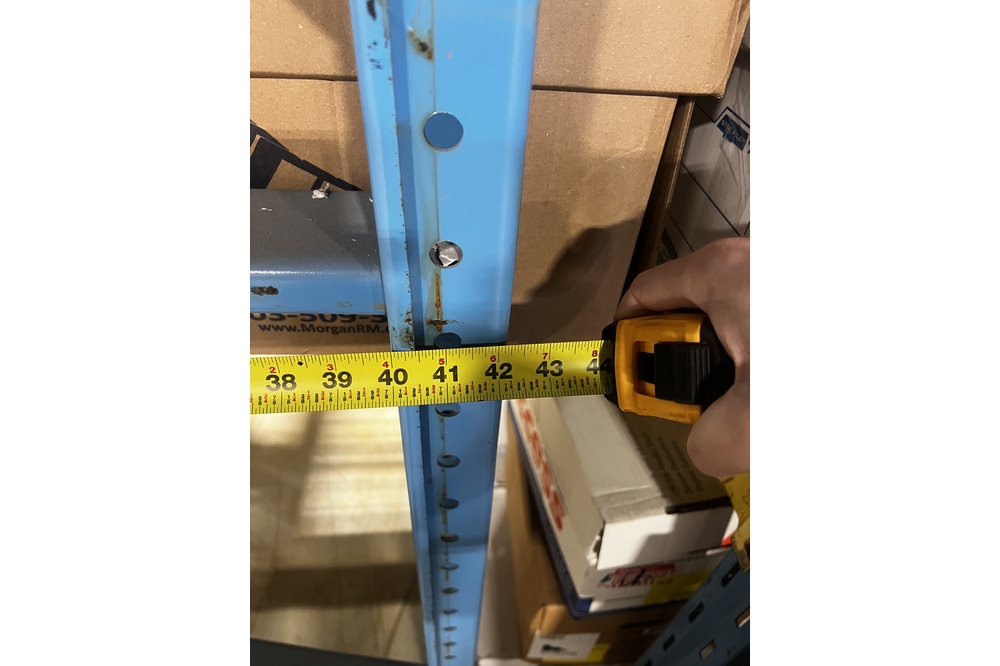 Images of used warehouse equipment liquidated from a record storage facility in Nashua, New Hampshire