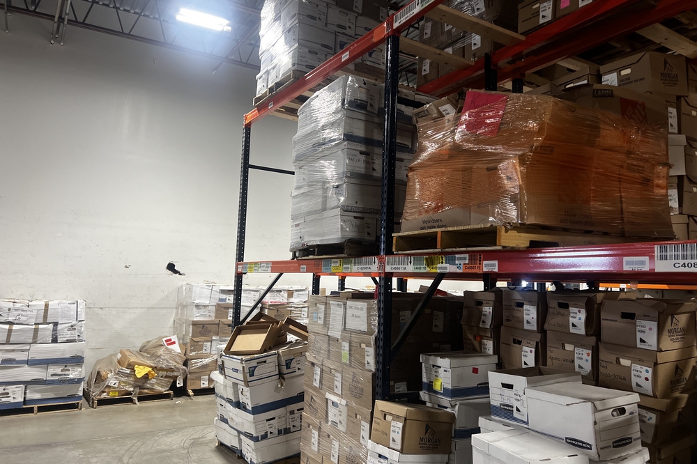 Images of used warehouse equipment liquidated from a record storage facility in Nashua, New Hampshire