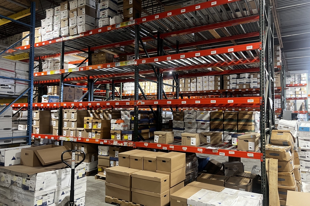 Images of used warehouse equipment liquidated from a record storage facility in Nashua, New Hampshire