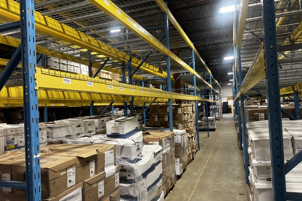 Images of used warehouse equipment liquidated from a record storage facility in Nashua, New Hampshire