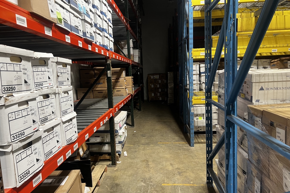 Images of used warehouse equipment liquidated from a record storage facility in Nashua, New Hampshire