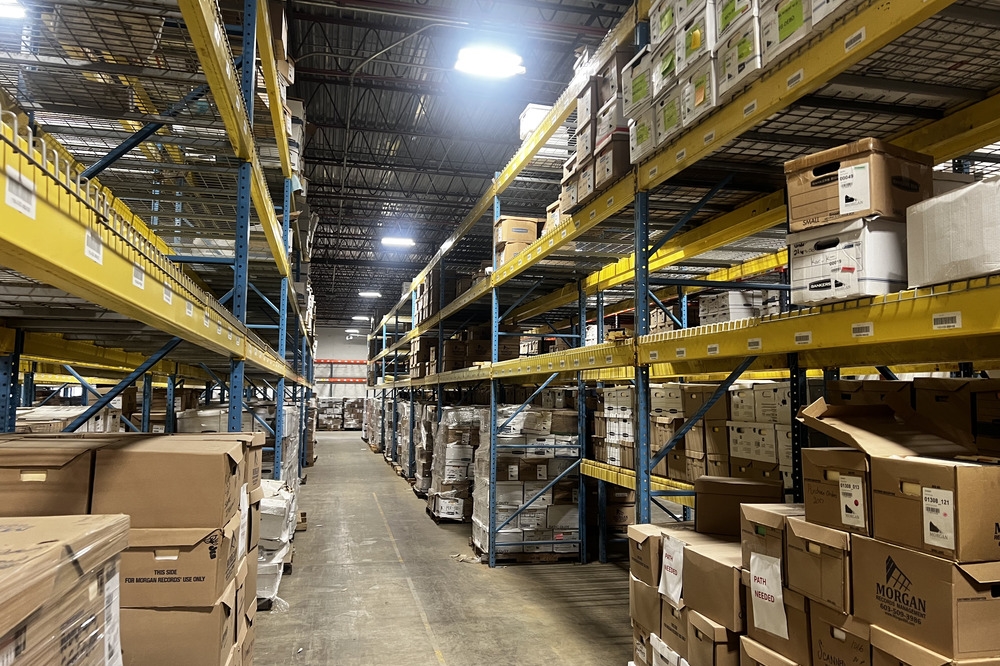 Images of used warehouse equipment liquidated from a record storage facility in Nashua, New Hampshire