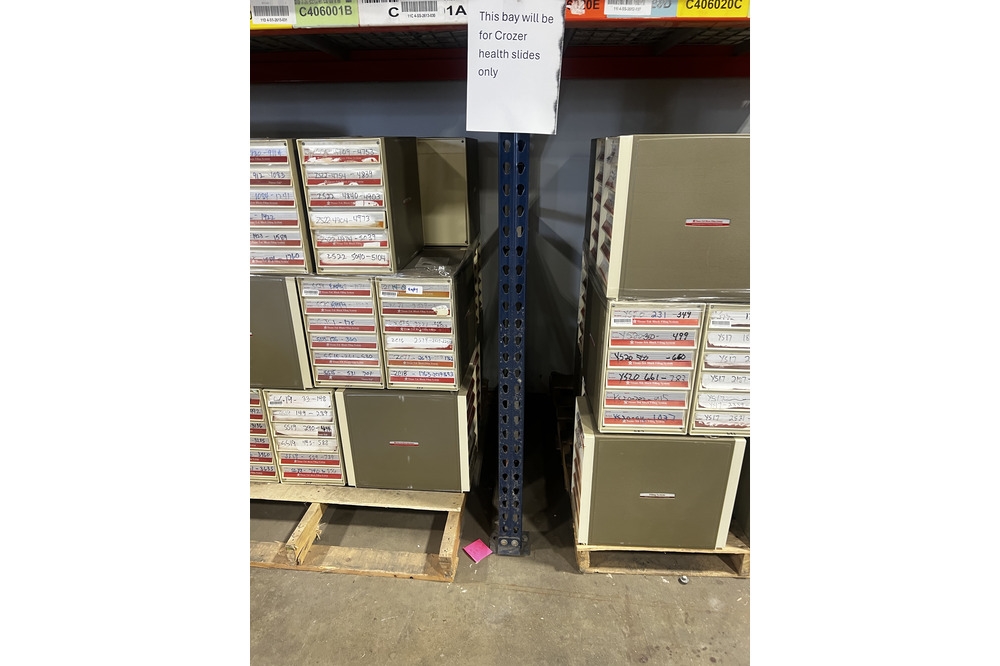 Images of used warehouse equipment liquidated from a record storage facility in Nashua, New Hampshire