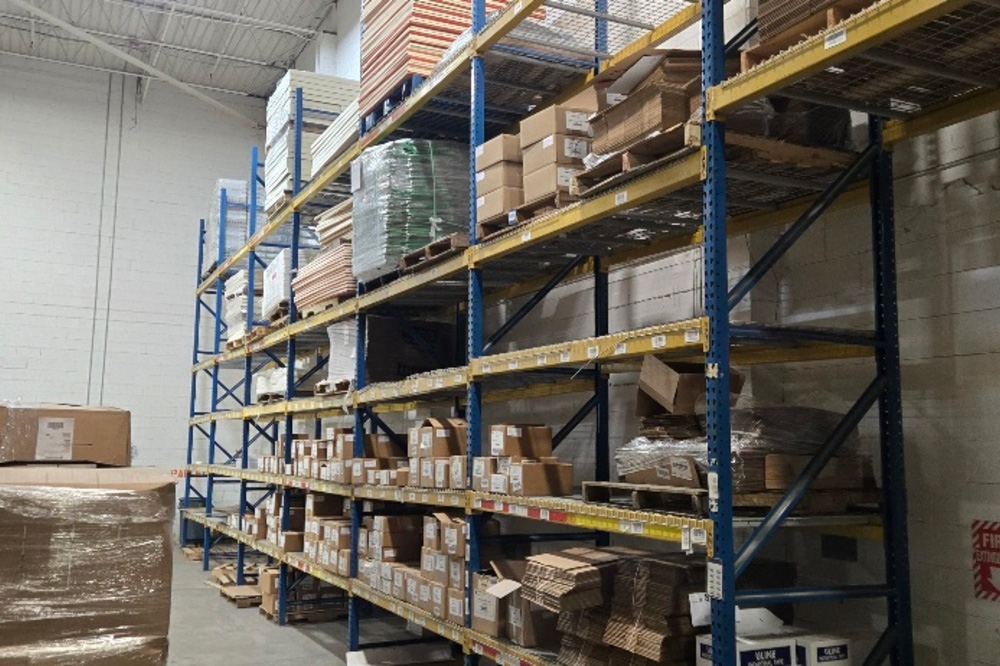 Images of used teardrop pallet racking material liquidated from a warehouse in Toledo, Ohio