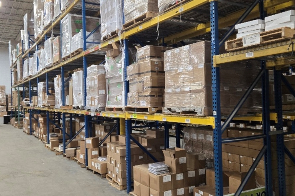 Images of used teardrop pallet racking material liquidated from a warehouse in Toledo, Ohio