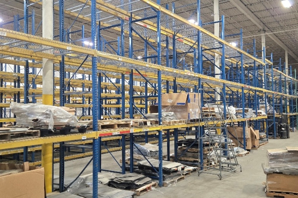 Images of used teardrop pallet racking material liquidated from a warehouse in Toledo, Ohio