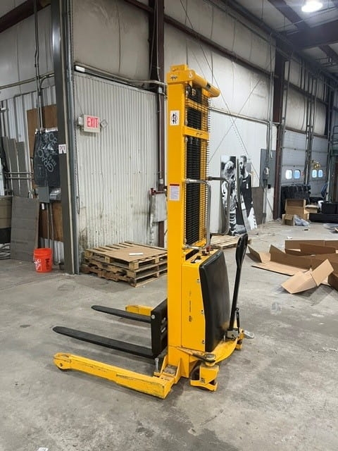 Used ULine H-5440 Straddle Stacker liquidated from a facility in Ipswich, Massachusetts by American Surplus
