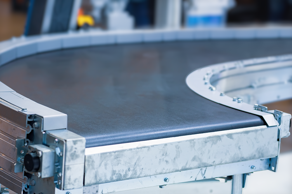 Used power belt conveyor available at American Surplus. Preventing belt misalignment and ensuring proper tensioning is a critical aspect of extending the lifespan of your belting.