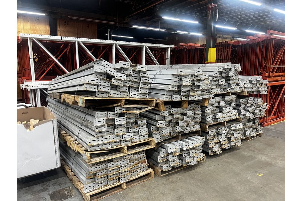 Images of disassembled teardrop pallet racking material liquidated from a warehouse in Newburyport, Massachusetts