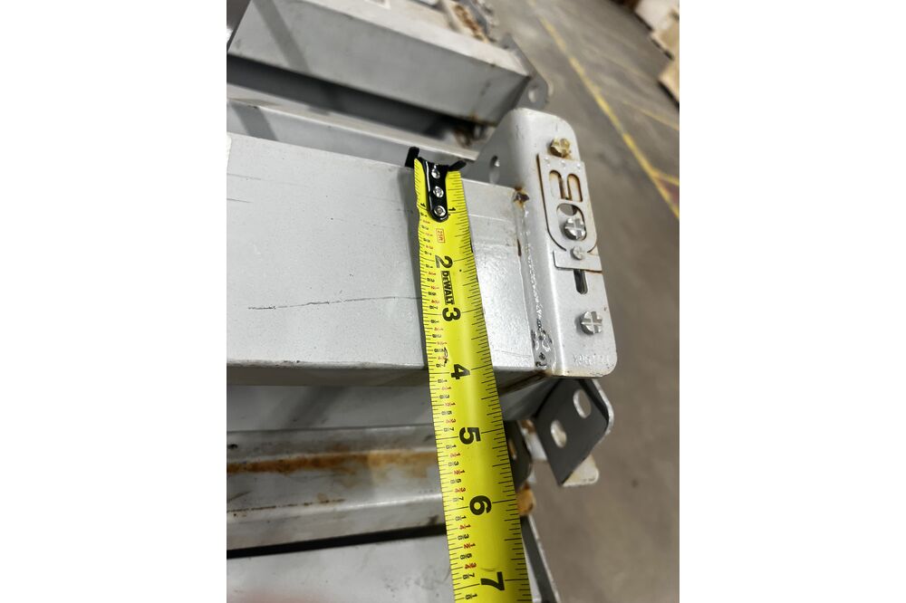 Images of disassembled teardrop pallet racking material liquidated from a warehouse in Newburyport, Massachusetts