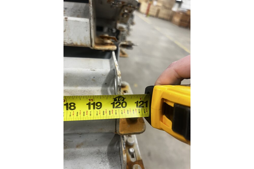 Images of disassembled teardrop pallet racking material liquidated from a warehouse in Newburyport, Massachusetts
