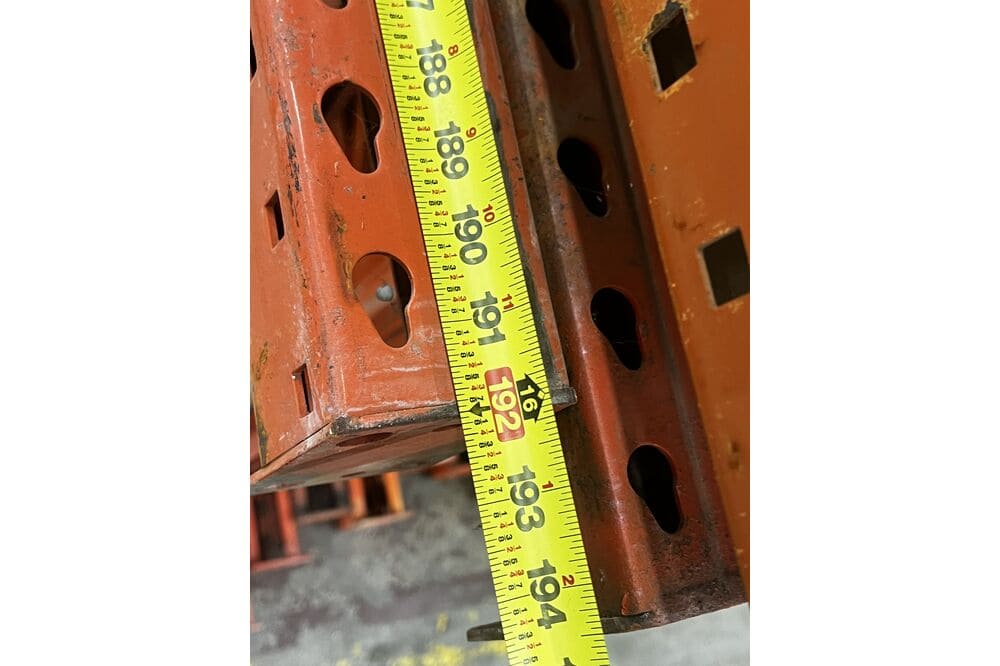 Images of disassembled teardrop pallet racking material liquidated from a warehouse in Newburyport, Massachusetts