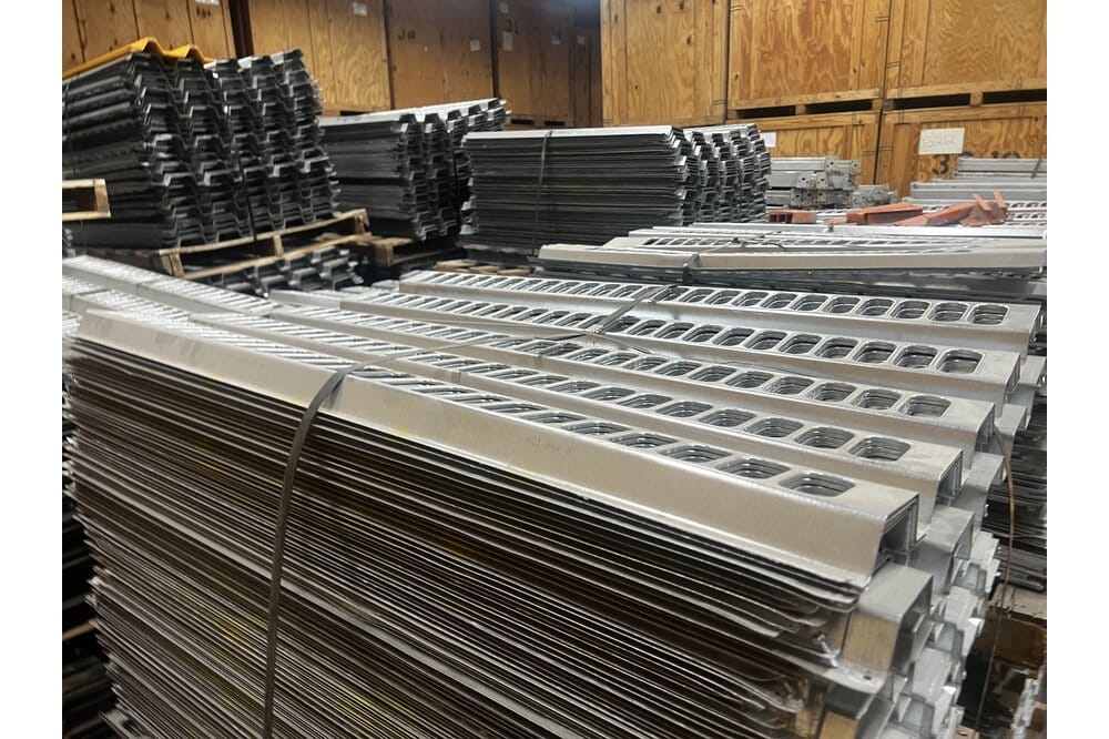 Images of disassembled teardrop pallet racking material liquidated from a warehouse in Newburyport, Massachusetts