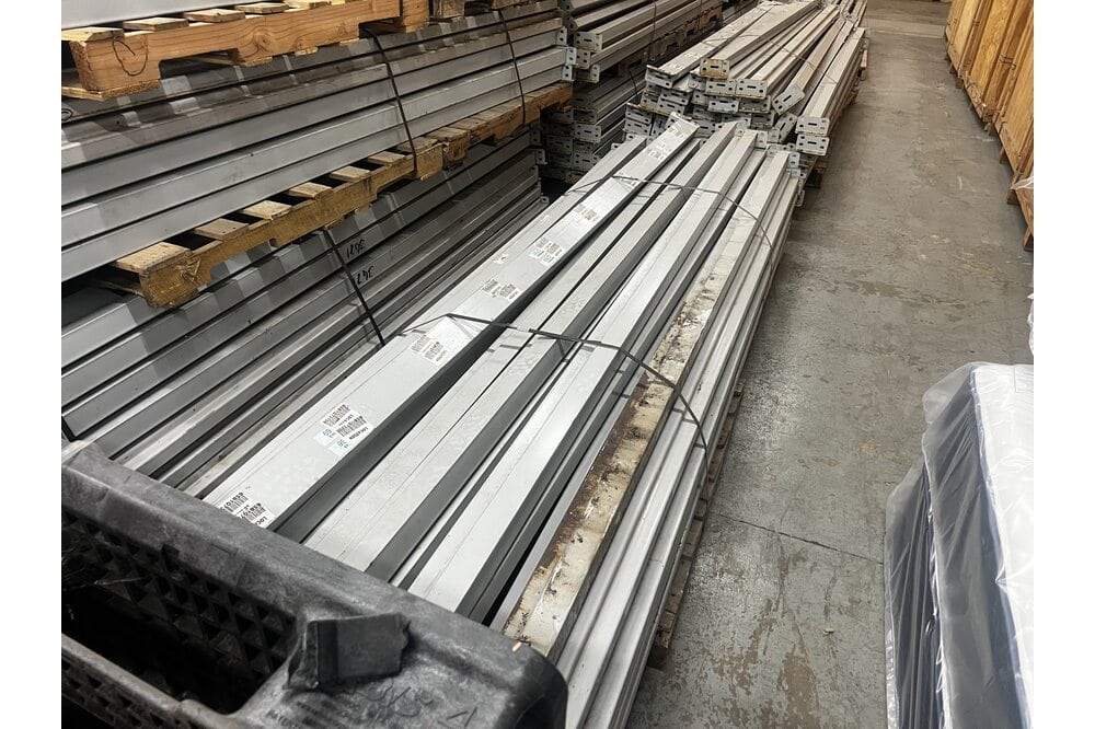 Images of disassembled teardrop pallet racking material liquidated from a warehouse in Newburyport, Massachusetts