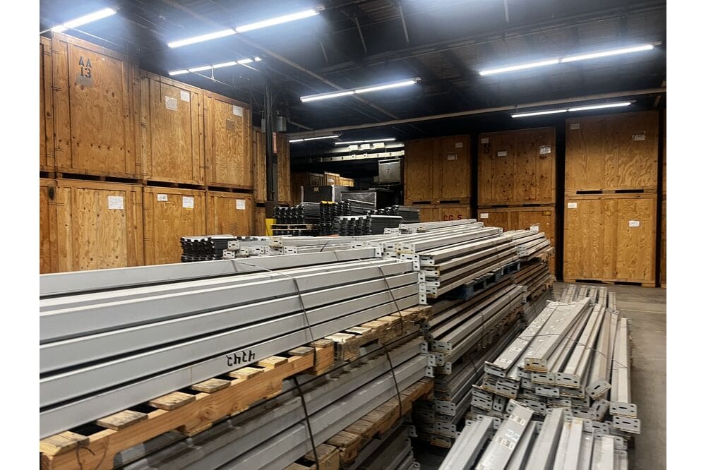 Images of disassembled teardrop pallet racking material liquidated from a warehouse in Newburyport, Massachusetts
