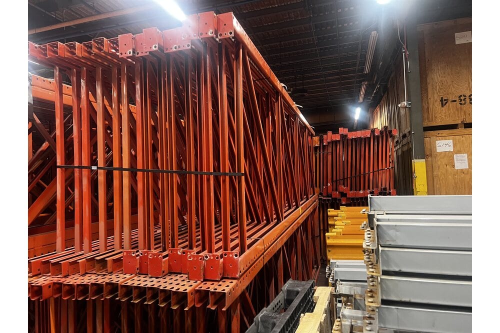 Images of disassembled teardrop pallet racking material liquidated from a warehouse in Newburyport, Massachusetts