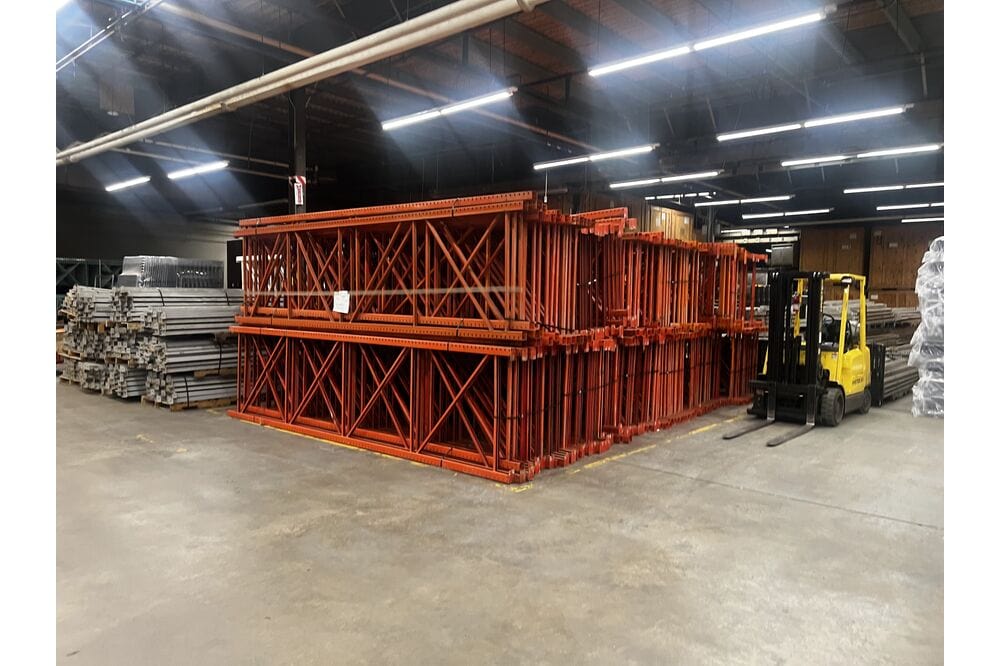Images of disassembled teardrop pallet racking material liquidated from a warehouse in Newburyport, Massachusetts