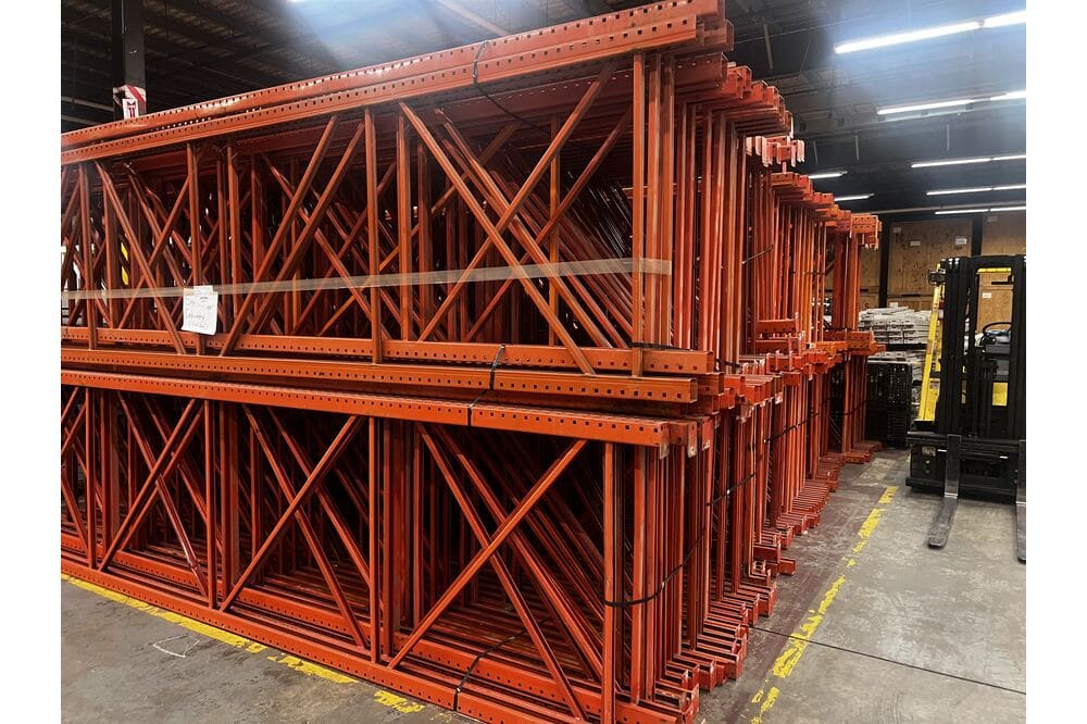 Images of disassembled teardrop pallet racking material liquidated from a warehouse in Newburyport, Massachusetts