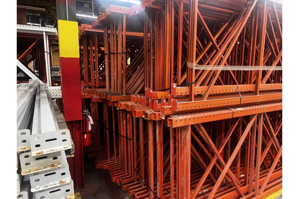 Images of disassembled teardrop pallet racking material liquidated from a warehouse in Newburyport, Massachusetts