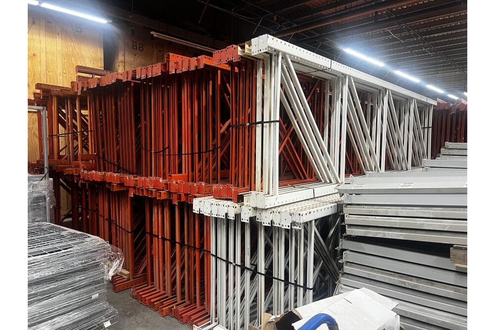 Images of disassembled teardrop pallet racking material liquidated from a warehouse in Newburyport, Massachusetts