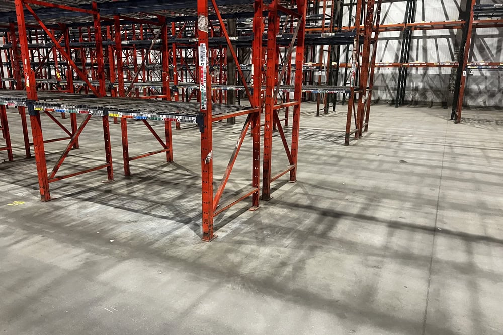 Complete structural rack frame assembly ready for shipment from American Surplus liquidation
