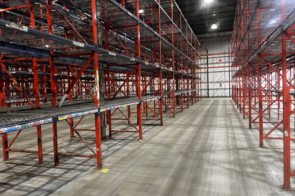 Structural pallet rack beams and columns in used warehouse storage system