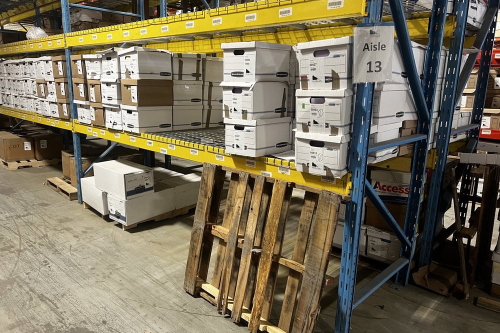 Images of used warehouse equipment liquidated from a record storage facility in Nashua, New Hampshire