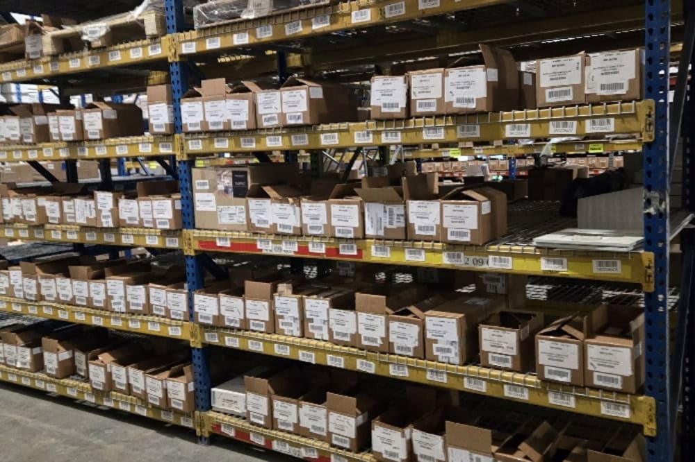 Images of used teardrop pallet racking material liquidated from a warehouse in Toledo, Ohio