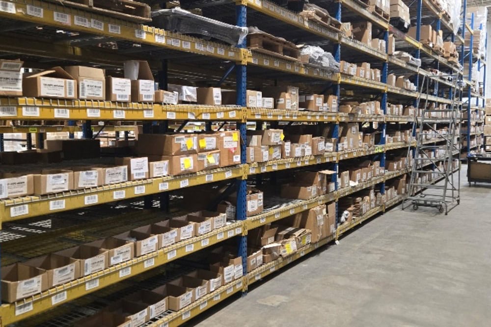 Images of used teardrop pallet racking material liquidated from a warehouse in Toledo, Ohio
