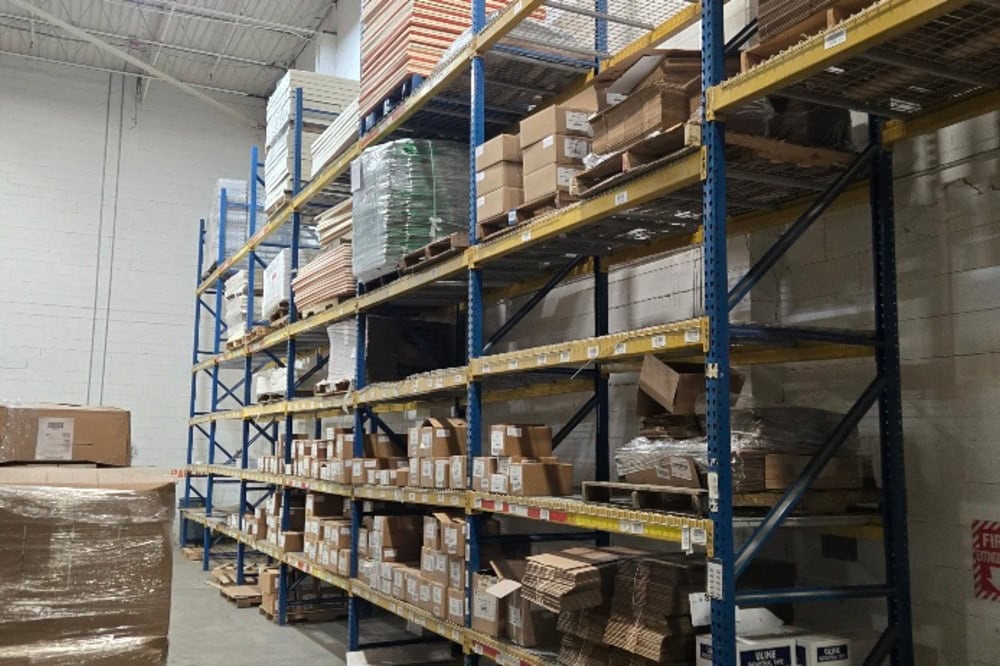 Images of used teardrop pallet racking material liquidated from a warehouse in Toledo, Ohio