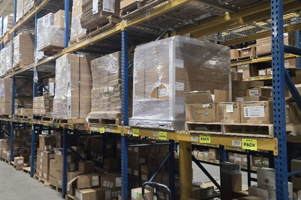 Images of used teardrop pallet racking material liquidated from a warehouse in Toledo, Ohio