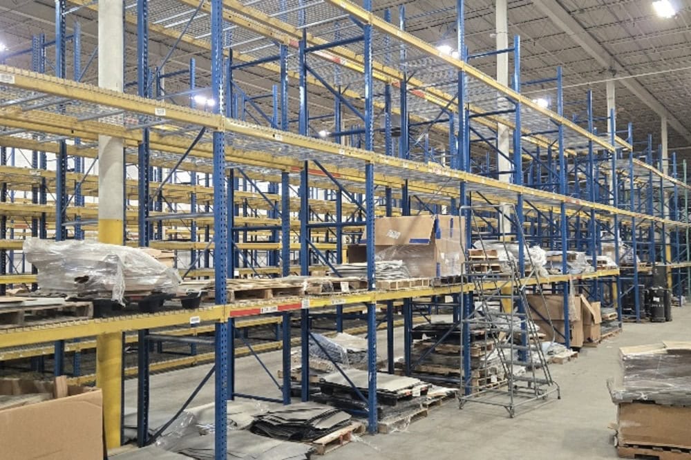 Images of used teardrop pallet racking material liquidated from a warehouse in Toledo, Ohio